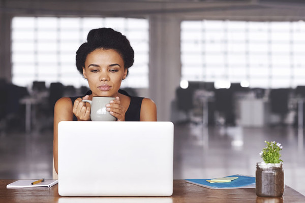 Woman in front of laptop